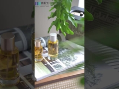 बॉक्स ग्लास/प्लास्टिक/धातु सामग्री के साथ 30 मिलीलीटर/50 मिलीलीटर/100 मिलीलीटर इत्र/कॉस्मेटिक बोतल